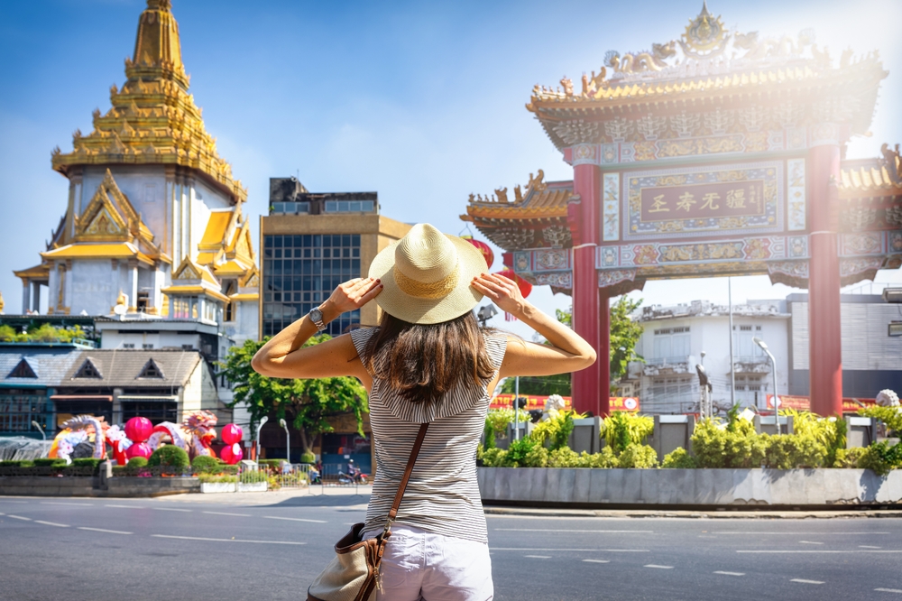 A,Tourist,Woman,On,Sightseeing,Tour,Stands,In,Front,Of